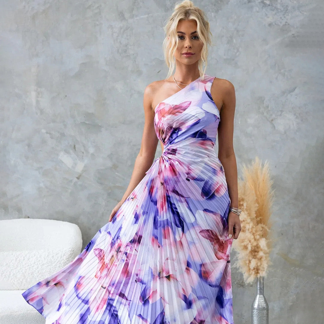 Noor™ | Maxi Plissé Jurk met Bloemen en Één Schouder