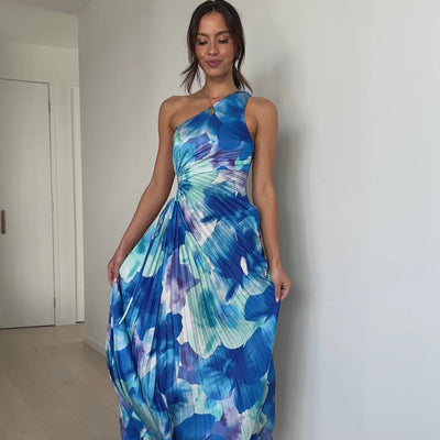 Noor™ | Maxi Plissé Jurk met Bloemen en Één Schouder